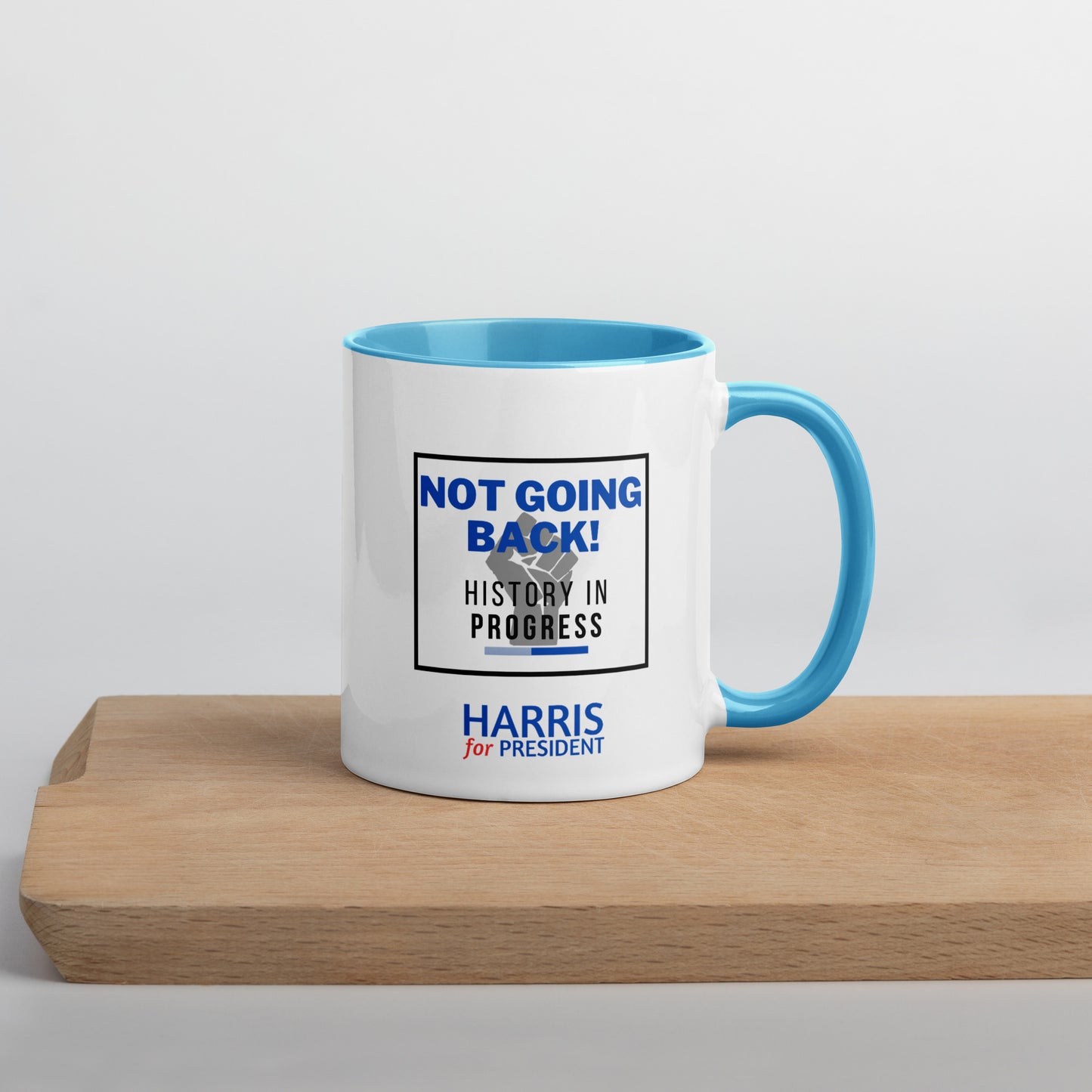 "Not Going Back" Kamala Harris 2024 President Mug with the Black Power fist and Colorful Interior - White Ceramic Coffee Mug Dishwasher and Microwave Safe