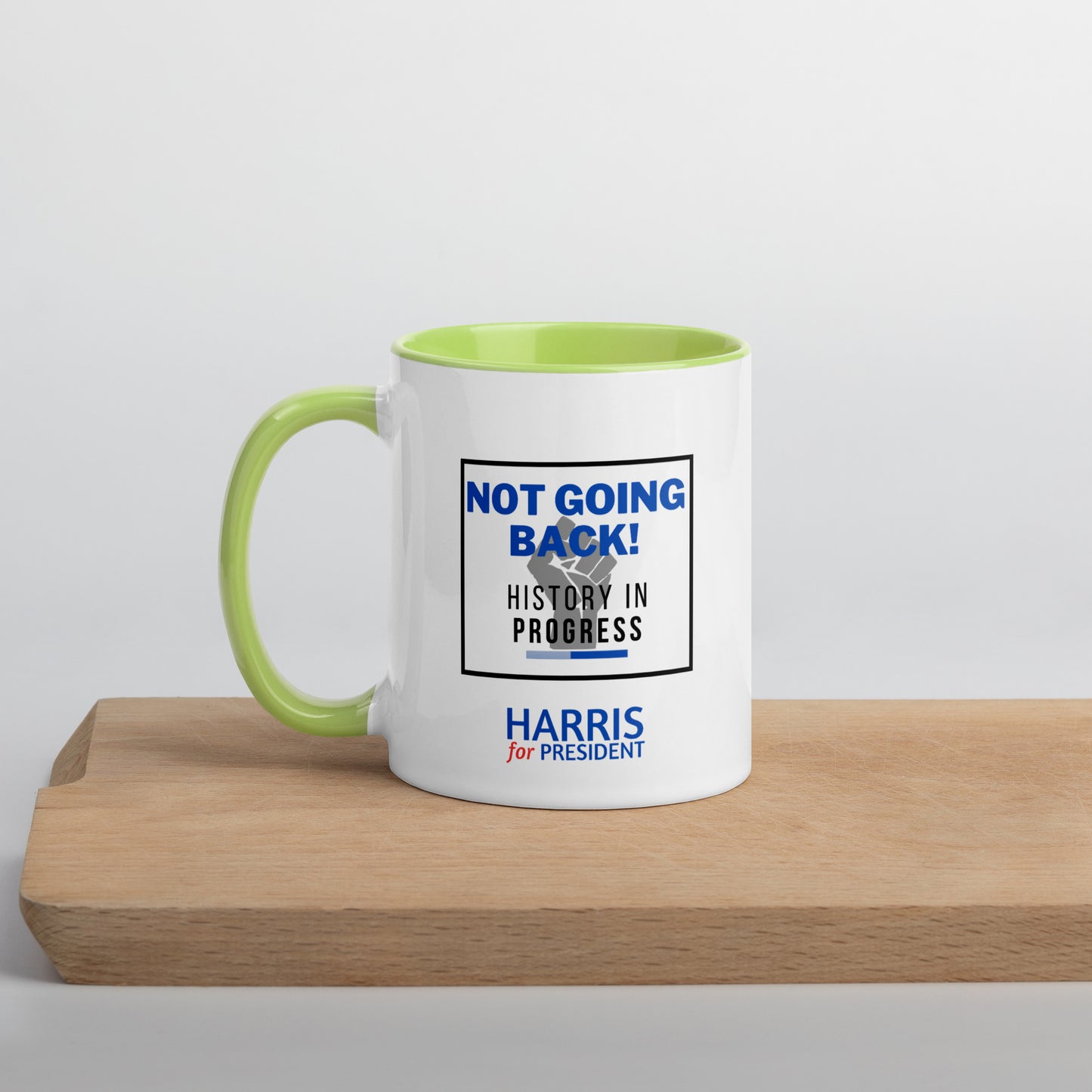 "Not Going Back" Kamala Harris 2024 President Mug with the Black Power fist and Colorful Interior - White Ceramic Coffee Mug Dishwasher and Microwave Safe